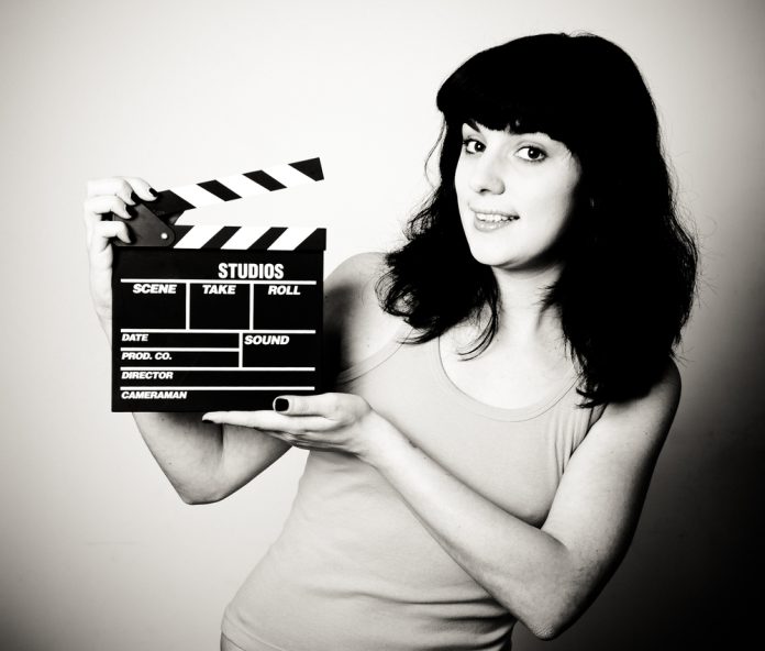 Smiling,Brunette,Girl,In,Vintage,Black,And,White,Casual,Clothes