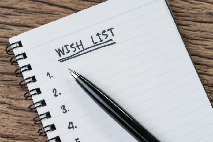 Wish,List,Concept,,Pen,On,White,Paper,Note,Pad,With