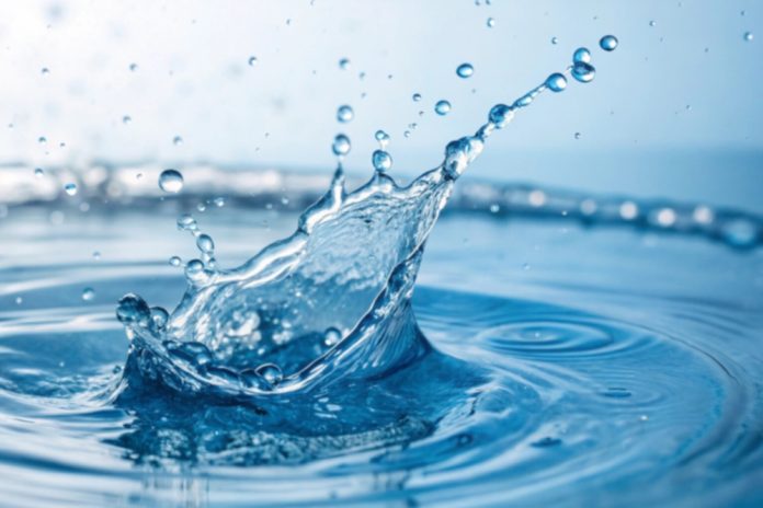 A,Stunning,Capture,Of,Clear,Blue,Water,Splashing,,Showcasing,The