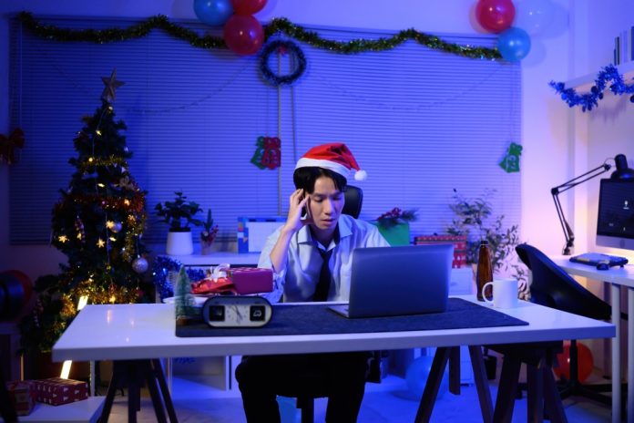 Holiday,Burnout,With,An,Office,Worker,On,Christmas,Night,,Christmas