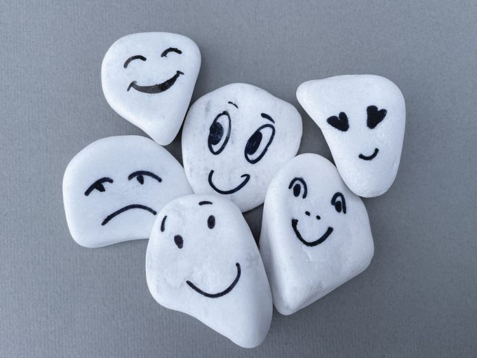 Emotion,Management,Concept,,Stones,With,Painted,Faces,Symbolize,Different,Emotions.