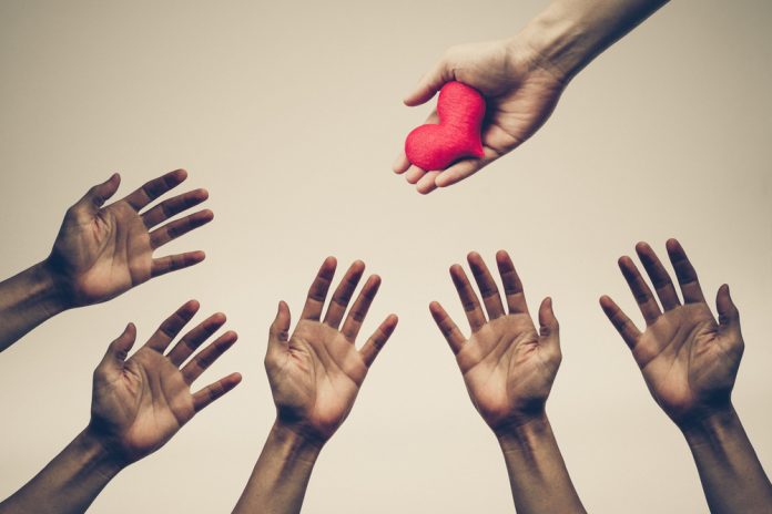 Many,Hands,Chasing,,Fighting,To,Get,A,Red,Heart,