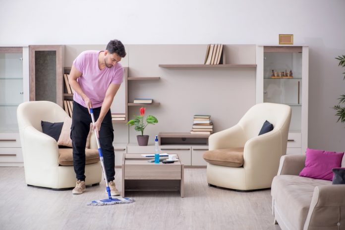 Young,Male,Contractor,Cleaning,The,House