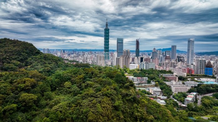 Taipeis,Skyline,Blends,Lush,Greenery,With,Modern,Architecture,Under,Cloudy