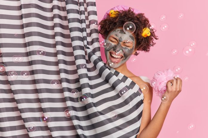 Hygiene,Procedures,And,Routines,Concept.,Joyful,Curly,Haired,Woman,Enjoys