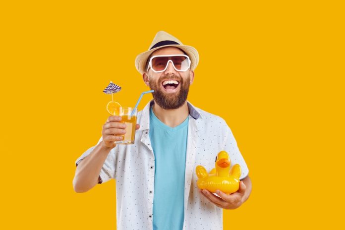 Portrait,Of,A,Funny,Bearded,Man,In,Beach,Hat,And