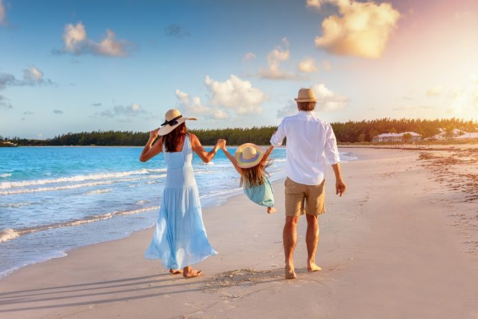 A,Happy,Family,In,Walks,Hand,In,Hand,Down,A