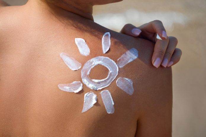 Skin,Care.,Sun,Protection.,Beauty,Woman,Applying,Sun,Cream,On