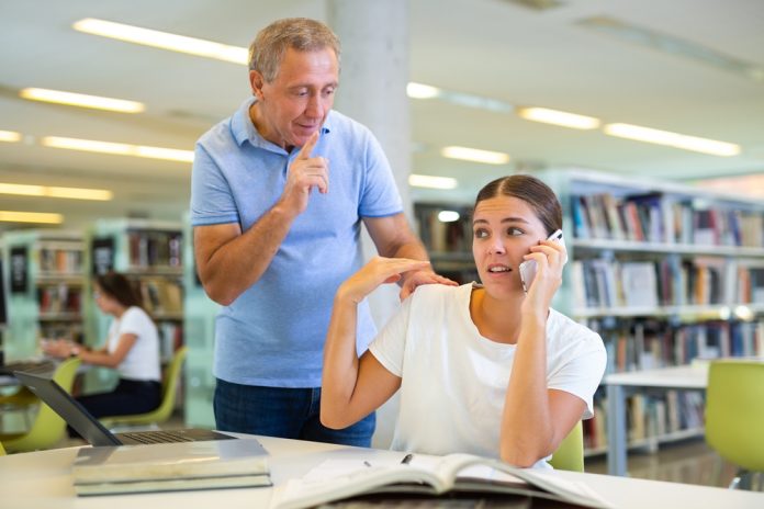Mature,European,Man,Interrupts,Noisy,Female,Caucasian,Student,With,Phone