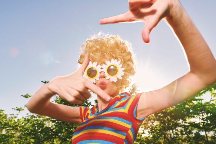 A,Retro,Lifestyle,Outdoors,Scene,Captures,A,Playful,,Colorful,Portrait