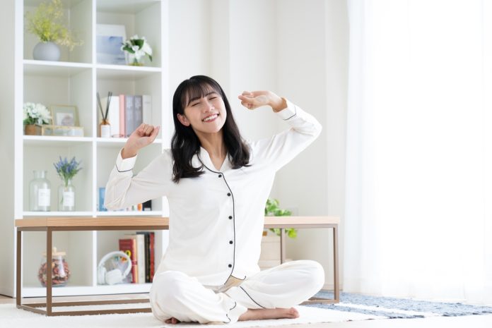 A,Young,Japanese,Woman,Relaxing,In,The,Living,Room.
