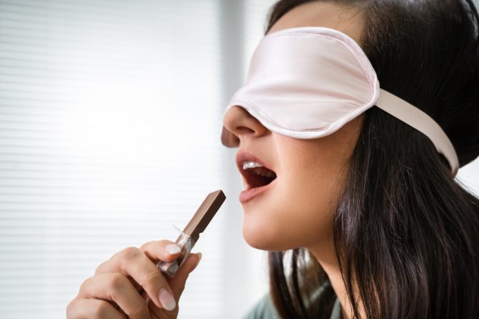 Portrait,Of,Blindfolded,Young,Woman,Testing,Food