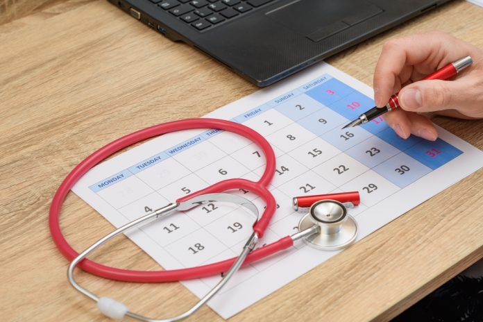Calendar,Sheet,And,Medical,Stethoscope,,Doctor's,Desk