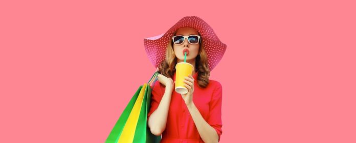 Portrait,Of,Beautiful,Relaxed,Young,Woman,Model,With,Colorful,Shopping