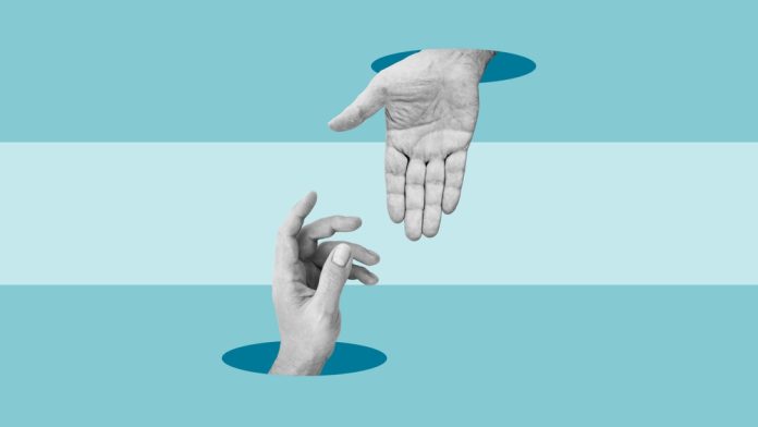 Helping,Hand,Concept,Is,Shown,By,One,Hand,Reaches,Out